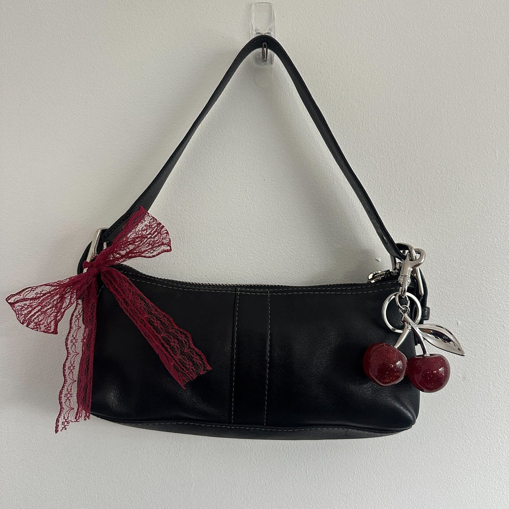 y2k coach black leather east west bag