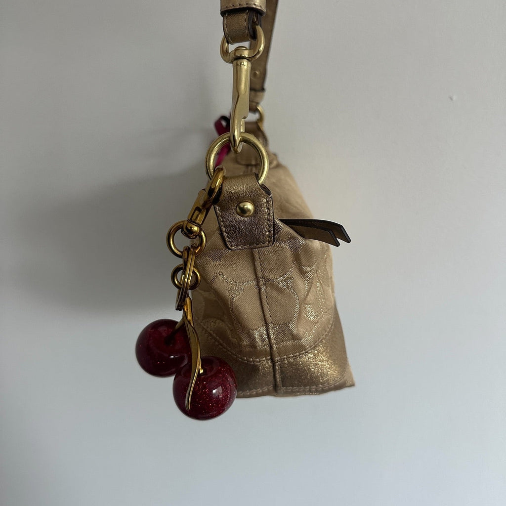 y2k coach gold shimmer top handle bag