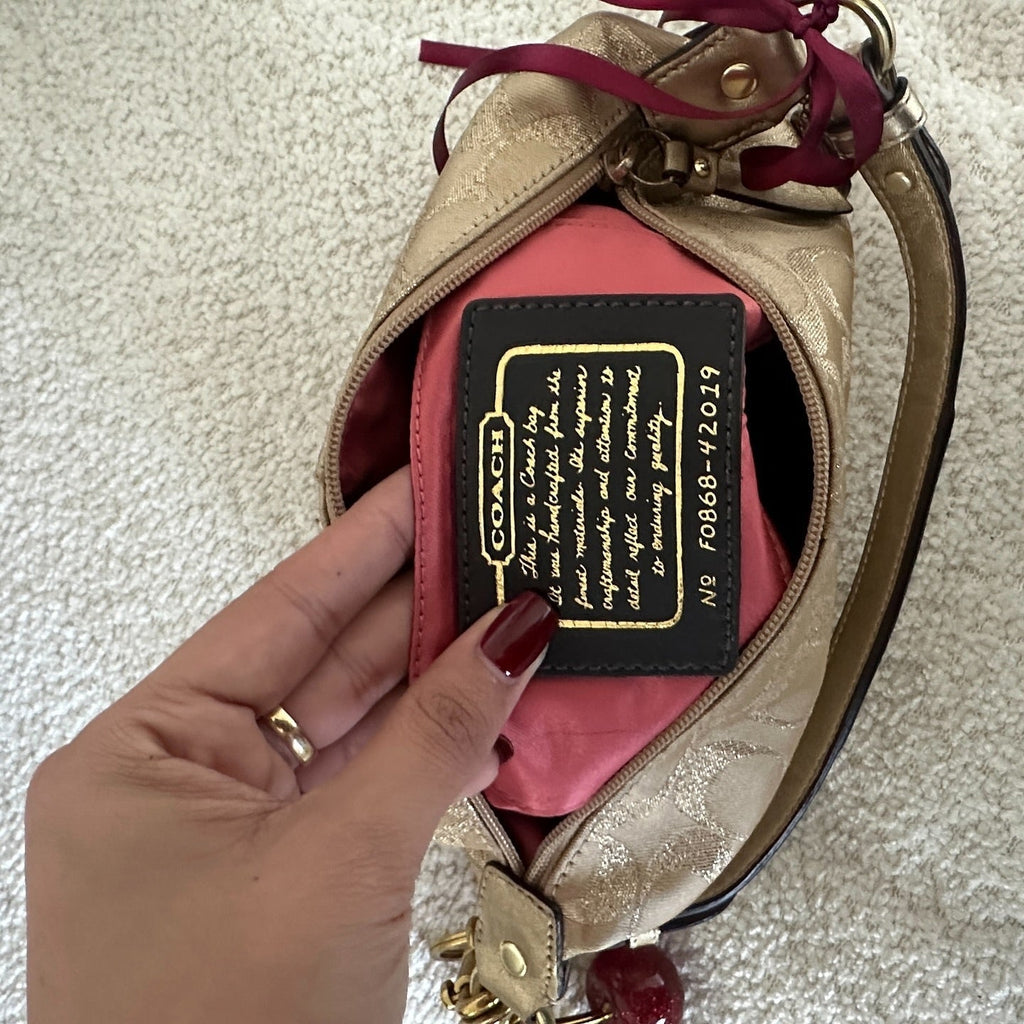 y2k coach gold shimmer top handle bag